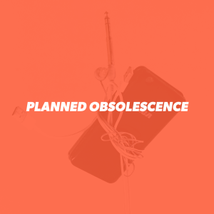 transparent orange with white words “PLANNED ONSOLESCENCE”background imitate is iPhone cords and a set of grey ear buds wrapped around a couple broken black smart phones. The photo is of the phones hanging by the cords but flipped so it looks like they are upright on the cords.